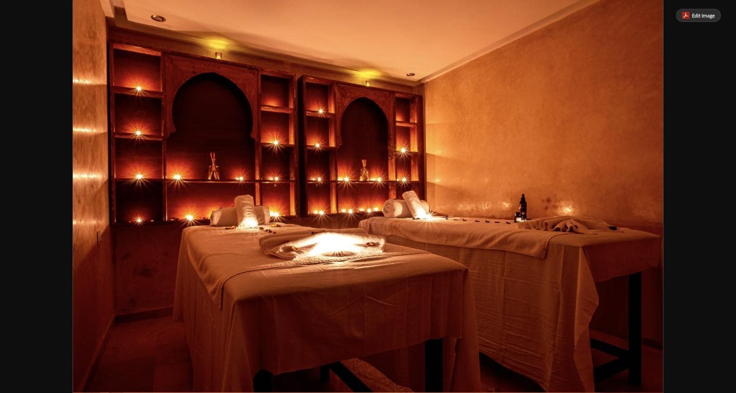 Cabine de massage duo du spa Hamdane, deux tables côte à côte dans une lumière tamisée